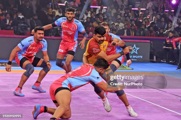 Pawan Kumar Sherawat of the Telugu Titans is in action during the Pro Kabaddi League season 10 match between the Jaipur Pink Panthers and the Telugu...