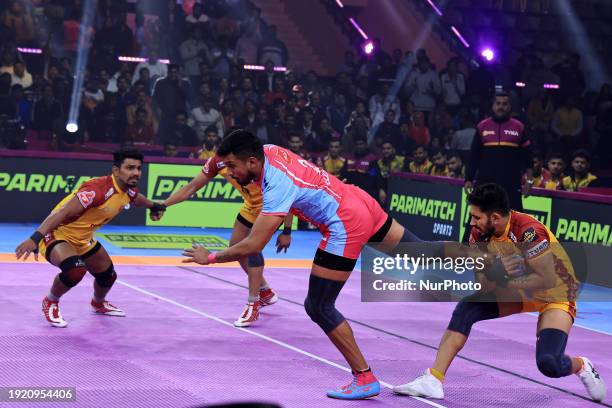 Arjun Deshwal of the Jaipur Pink Panthers is in action during their Pro Kabaddi League season 10 match against the Telugu Titans at Sawai Mansingh...