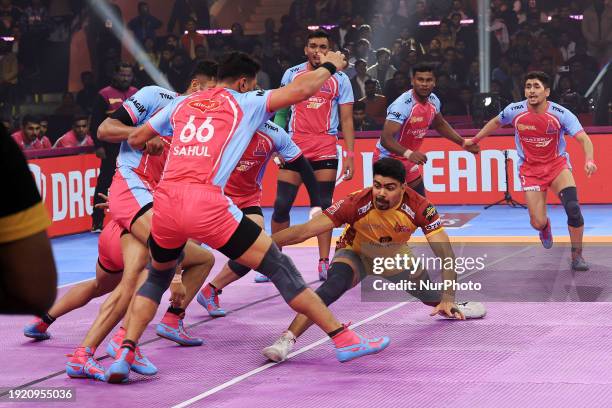 Pawan Kumar Sherawat of the Telugu Titans is in action during the Pro Kabaddi League season 10 match between the Jaipur Pink Panthers and the Telugu...