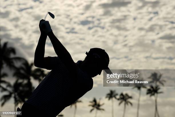 Adrien Dumont de Chassart of Belgium plays his shot from the 11th tee during a practice round prior to the Sony Open in Hawaii at Waialae Country...