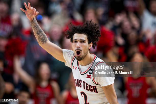 Pop Isaacs of the Texas Tech Red Raiders celebrates after making a three-pointer during the first half of the game against the Oklahoma State Cowboys...