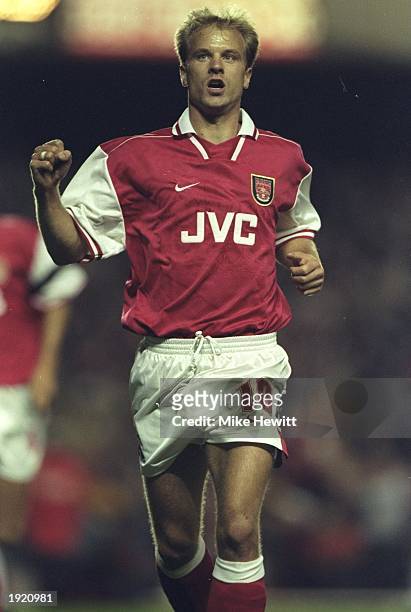 Dennis Bergkamp of Arsenal celebrates a goal during the UEFA Cup first round second leg match against Paok Salonika at Highbury in London. The match...