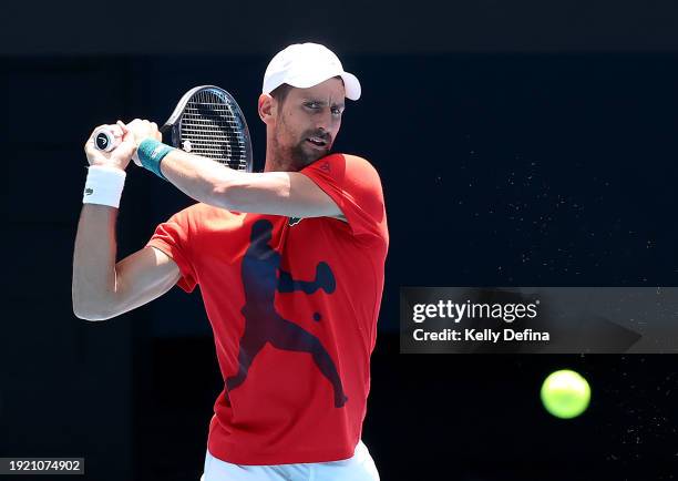 Novak Djokovic of Serbia plays a backhand during a training session ahead of the 2024 Australian Open at Melbourne Park on January 10, 2024 in...