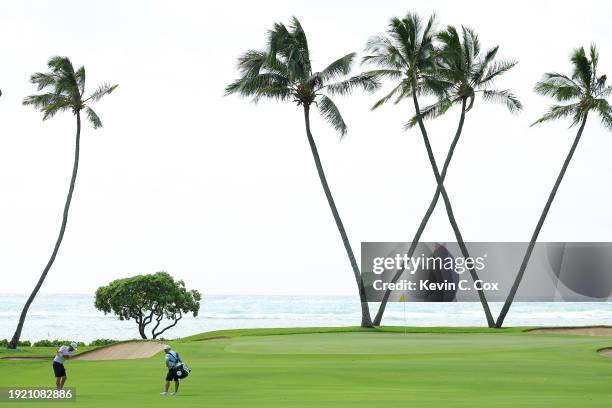 Lanto Griffin of the United States plays a shot on the 16th hole during a practice round prior to the Sony Open in Hawaii at Waialae Country Club on...