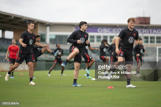 Jackson Ragen, Brian White and Aidan Morris warm up during a USMNT winter camp on January 9, 2024 in Orlando, Florida.
