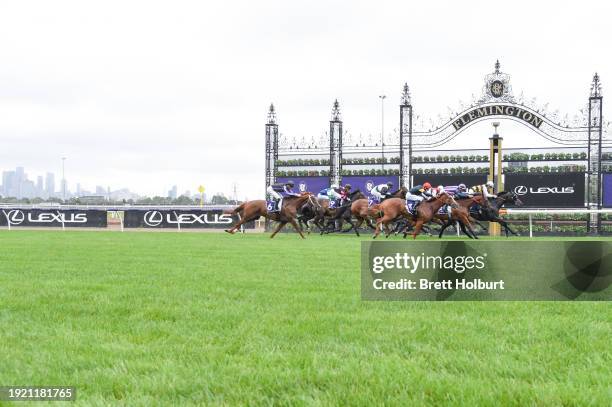 Regal Vow ridden by Jack Hill wins the Jockey Acknowledgement Plate at Flemington Racecourse on January 13, 2024 in Flemington, Australia.