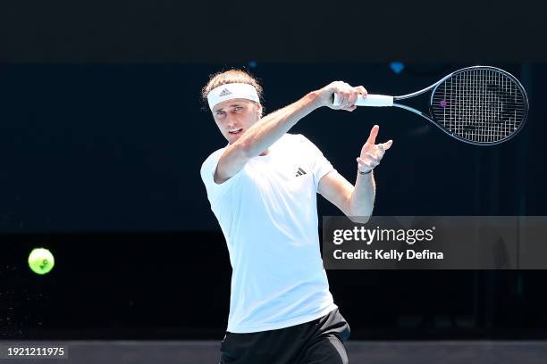 Alexander Zverev of Germany plays a forehand during a training session ahead of the 2024 Australian Open at Melbourne Park on January 10, 2024 in...