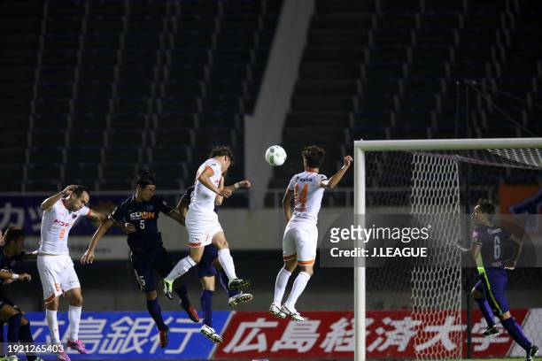 Ataru Esaka of Omiya Ardija heads to score the team's first goal during the J.League J1 second stage match between Sanfrecce Hiroshima and Omiya...