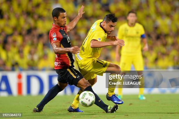 Diego Oliveira of Kashiwa Reysol controls the ball against Wellington Daniel Bueno of Kashima Antlers during the J.League J1 second stage match...