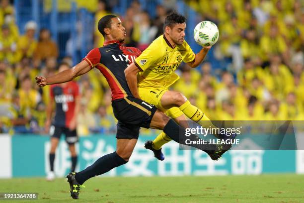 Diego Oliveira of Kashiwa Reysol and Wellington Daniel Bueno of Kashima Antlers compete for the ball during the J.League J1 second stage match...