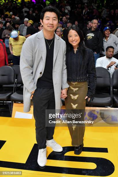 Actor Simu Liu and Allison Hsu attend a basketball game between the Los Angeles Lakers and the Toronto Raptors at Crypto.com Arena on January 09,...