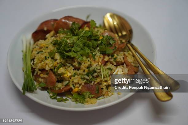 chinese sausage fried rice - scallion brush stock pictures, royalty-free photos & images