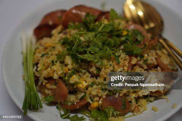 chinese sausage fried rice - scallion brush stock pictures, royalty-free photos & images