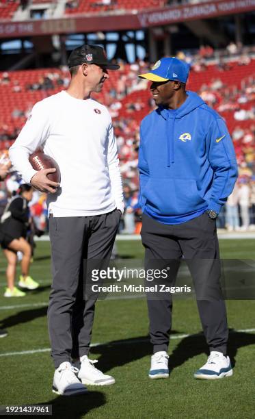 Head Coach Kyle Shanahan of the San Francisco 49ers with defensive coordinator Raheem Morris of the Los Angeles Rams before the game at Levi's...