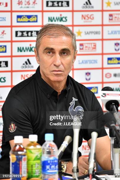 Head coach Bosko Gjurovski of Nagoya Grampus speaks at the post match press conference after the J.League J1 second stage match between Albirex...