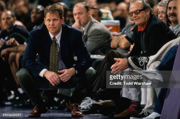 Actor Jack Nicholson looks on from the sideline beside Danny Ainge Head Coach for the Phoenix Suns during the NBA Pacific Division basketball game...