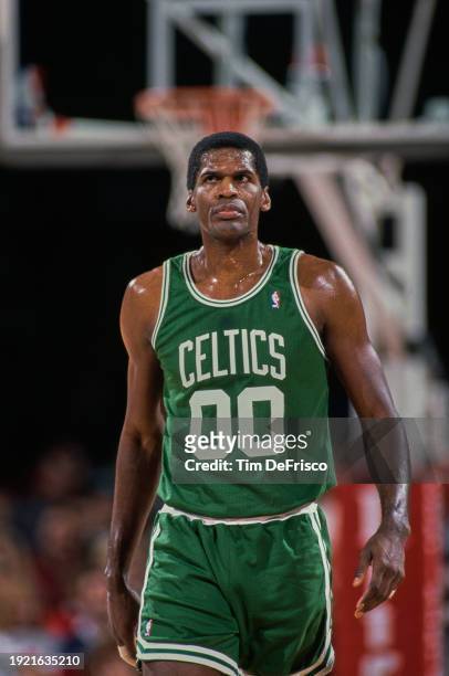 Robert Parish, Center for the Boston Celtics looks on during the NBA Midwest Division basketball game against the Denver Nuggets on 28th December...