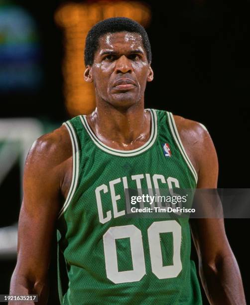 Robert Parish, Center for the Boston Celtics looks on during the NBA Midwest Division basketball game against the Denver Nuggets on 28th December...