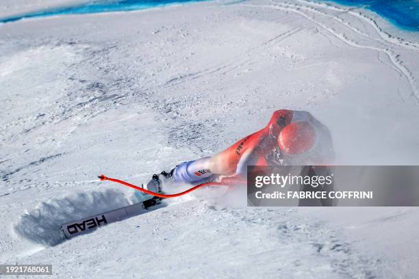 Switzerland's Justin Murisier crashes during the Downhill of the FIS Alpine Skiing Men's World Cup event in Wengen on January 13, 2024.