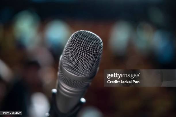 microphone in theatre - acoustic music stock pictures, royalty-free photos & images