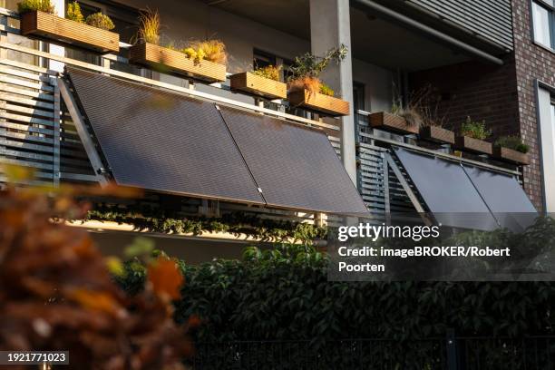 balcony power plant solar power plant on a balcony in duesseldorf, germany, europe - kraftwerk stock-fotos und bilder