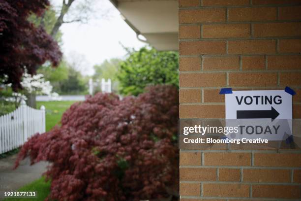 a voting sign on a wall - canadian maple leaf icon stock pictures, royalty-free photos & images