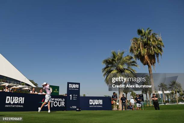 Rory McIlroy of Northern Ireland tees off on the first hole during a practice round prior to the Dubai Invitational at Dubai Creek Golf and Yacht...