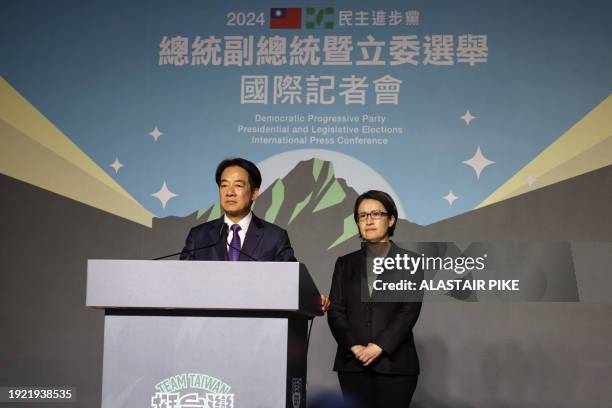 Taiwan's President-elect Lai Ching-te and his running mate Hsiao Bi-khim attend a press conference outside the headquarters of the Democratic...