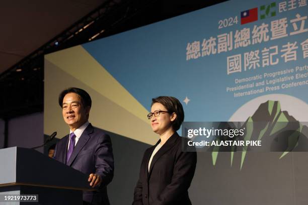 Taiwan's President-elect Lai Ching-te and his running mate Hsiao Bi-khim attend a press conference outside the headquarters of the Democratic...