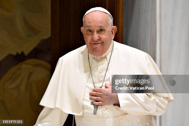 Pope Francis greets faithful during the weekly General Audience at the Paul VI Hall on January 10, 2024 in Vatican City, Vatican. As he led his...