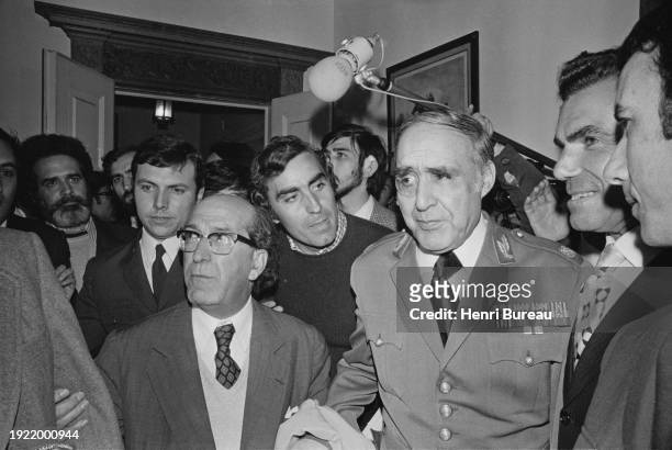 President of the Junta Antonio de Spinola come to greet exiled socialist leader Mario Soares upon his return, authorized by the Junta three days...