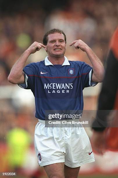 Paul Gascoigne of Rangers celebrates during a Scottish Premier League match against Dundee United at Tannadice Park in Dundee, Scotland. Dundee...