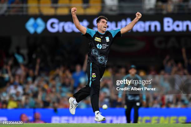 Xavier Bartlett of the Heat celebrates dismissing Jhye Richardson of the Scorchers with the last ball of the match during the BBL match between the...