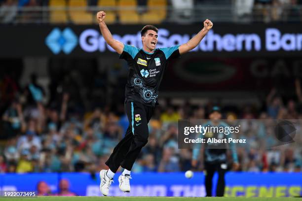 Xavier Bartlett of the Heat celebrates dismissing Jhye Richardson of the Scorchers with the last ball of the match during the BBL match between the...