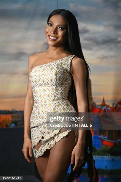 Attendee 'Angele Anang' poses for a photo during RuPaul's DragCon UK 2024 Drag Queen convention at the ExCeL centre in east London on January 13,...