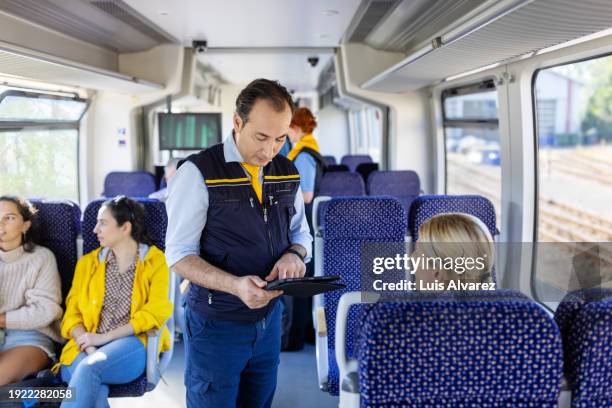 Ticket Inspector Machine Train Ticket Inspector Photos and Premium High Res Pictures - Getty Images