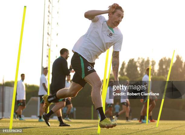Connor Metcalfe of Australia runs during an Australia Socceroos training session ahead of the the AFC Asian Cup at Qatar University Field 11 on...
