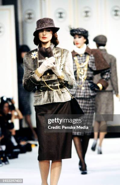 Model walks in the Chanel Fall 1983 Ready to Wear Runway Show on March 21 in Paris, France.