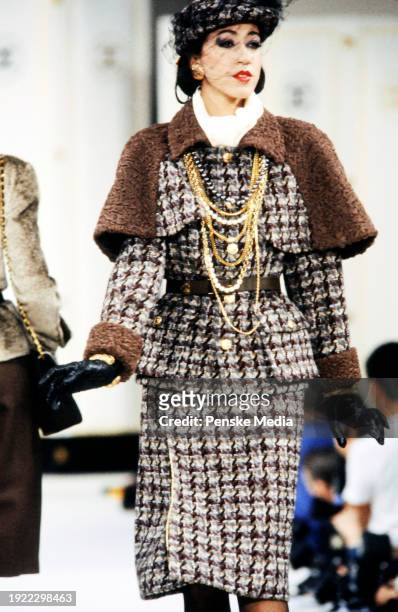 Model Pat Cleveland walks in the Chanel Fall 1983 Ready to Wear Runway Show on March 21 in Paris, France.