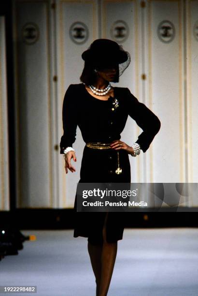 Model walks in the Chanel Fall 1983 Ready to Wear Runway Show on March 21 in Paris, France.