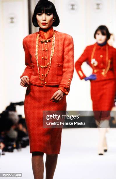 Model walks in the Chanel Fall 1983 Ready to Wear Runway Show on March 21 in Paris, France.