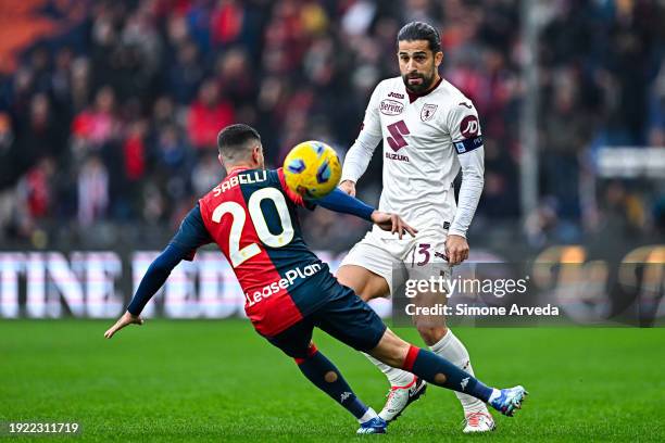 Stefano Sabelli of Genoa and Ricardo Rodriguez of Torino vie for the ball during the Serie A TIM match between Genoa CFC and Torino FC at Stadio...