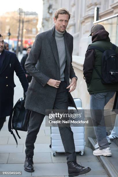 Peter Crouch and Abbey Clancy seen arriving at a hotel on Abbey's 38th Birthday on January 10, 2024 in London, England.