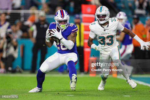 Ty Johnson of the Buffalo Bills makes a catch during an NFL football game against the Miami Dolphins at Hard Rock Stadium on January 7, 2024 in Miami...