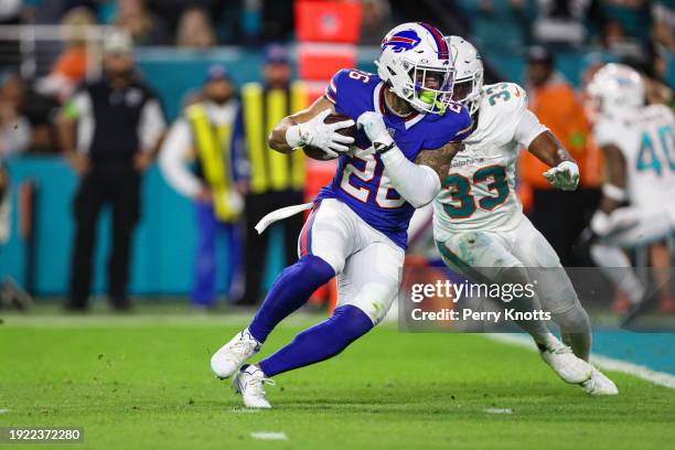 Ty Johnson of the Buffalo Bills makes a catch during an NFL football game against the Miami Dolphins at Hard Rock Stadium on January 7, 2024 in Miami...