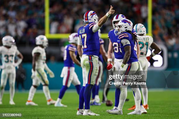 Josh Allen of the Buffalo Bills celebrates during an NFL football game against the Miami Dolphins at Hard Rock Stadium on January 7, 2024 in Miami...