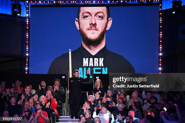 Mark Allen of England enters the arena his first round match against John Higgins of Scotland on day four of the MrQ Masters Snooker 2024 at...