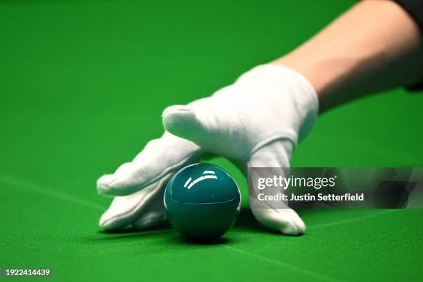 The referee places the green on the spot during day four of the MrQ Masters Snooker 2024 at Alexandra Palace on January 10, 2024 in London, England.