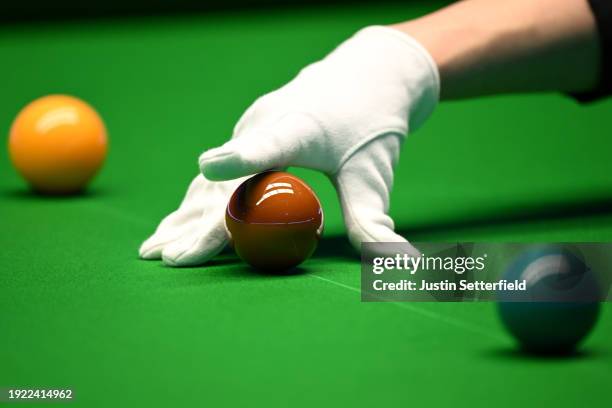 The referee places the brown on the spot during day four of the MrQ Masters Snooker 2024 at Alexandra Palace on January 10, 2024 in London, England.