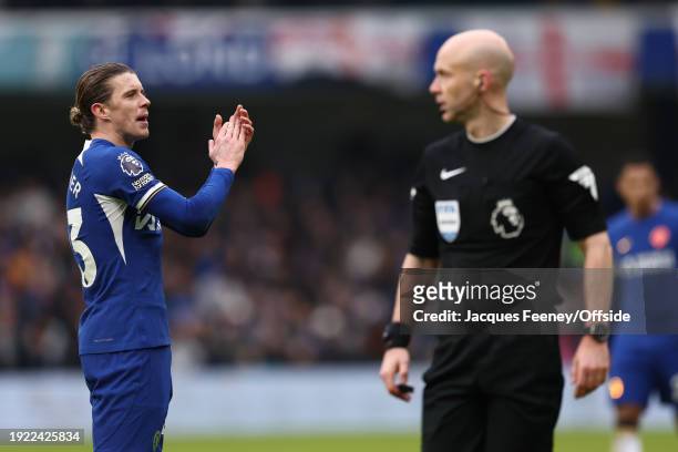 Conor Gallagher of Chelsea and match referee Anthony Taylor during the Premier League match between Chelsea FC and Fulham FC at Stamford Bridge on...
